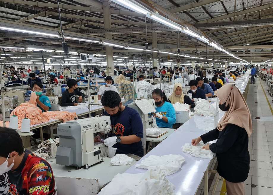 Team members sewing garments at the Sukabumi factory